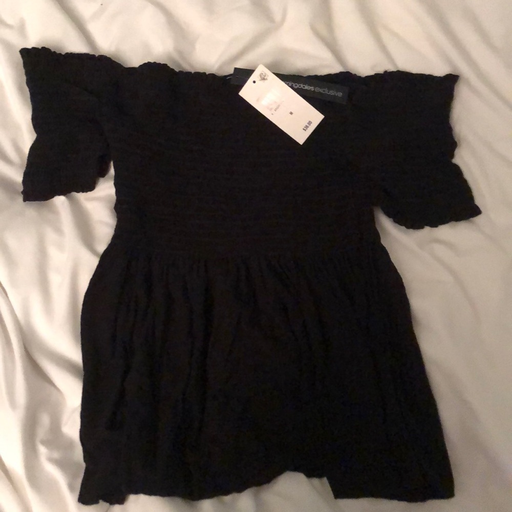 Off the shoulder top. Flowy at the bottom